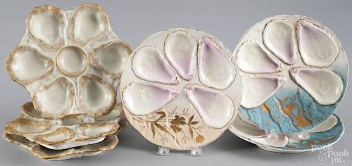 Six porcelain oyster plates, ca. 1900, to include a pair marked Weimar, approx. 8 3/4'' dia.
