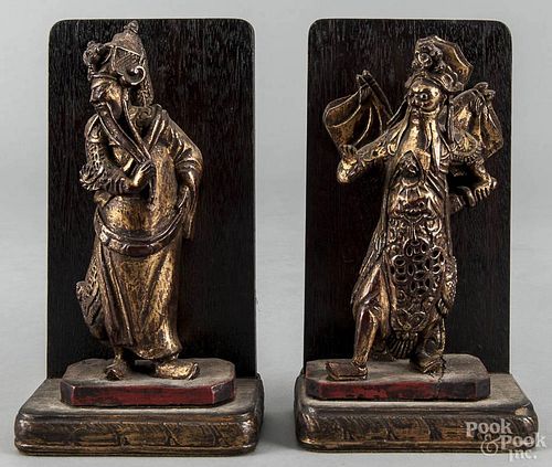 Pair of Chinese carved and gilded figural bookends, early 20th c., 9'' h., 4 3/4'' w.
