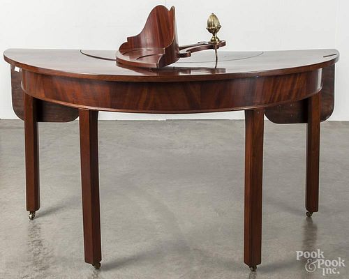 George III mahogany demilune table, ca. 1780, the demilune cutout with a lazy susan insert, 29'' h.