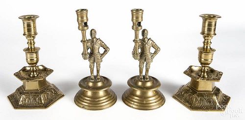 Pair of Gothic style brass figural candlesticks, early 20th c., 9'' h., together with another pair