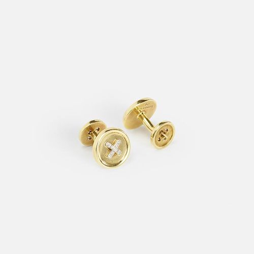 Tiffany & Co., A pair of gold and diamond Button cufflinks