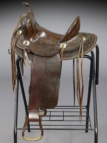 Tooled leather Western style saddle,
