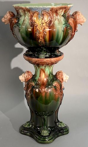 Majolica planter on pedestal, each with lion heads. ht. 22in., dia. 13 1/2in.