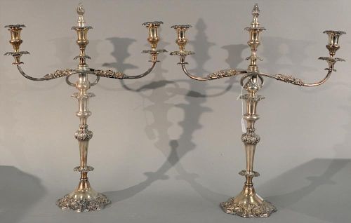 Sheffield silverplated candelabra having repousse floral style bobeches and base, marked: Warranted silver mounted, 19th
