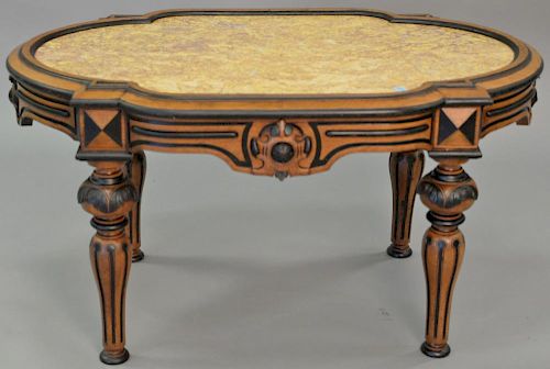 Oval Victorian marble top table cut down to coffee table. ht. 19in., top: 28" x 37" Provenance: Property from the Estate of F