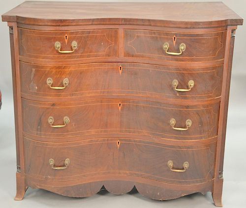 Serpentine mahogany four drawer chest, (veneer damage left front) ht. 35in., wd. 40in., dp. 23 1/2in.