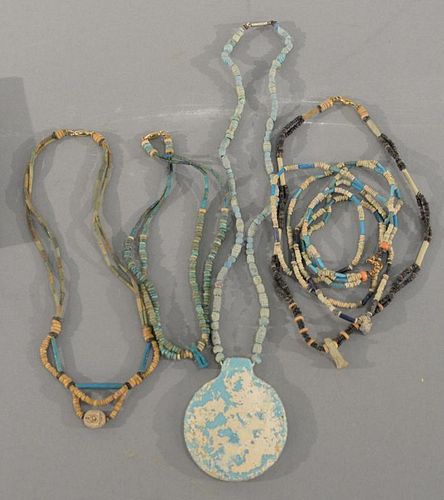 Group of five Egyptian Faience beaded necklaces with small stone pendant figures.