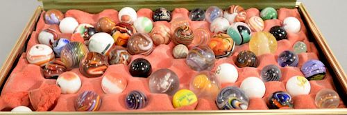 Group of antique marbles to include swirl marbles, common eyes, cork screws, cane cut, solid core, and solphides.