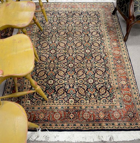 Oriental throw rug. 4'2" x 6' Provenance: Property from the Estate of Frank Perrotti Jr. of Hamden, Connecticut