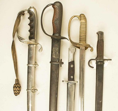 A US Saber and 2 Japanese Swords and 2 Bayonets