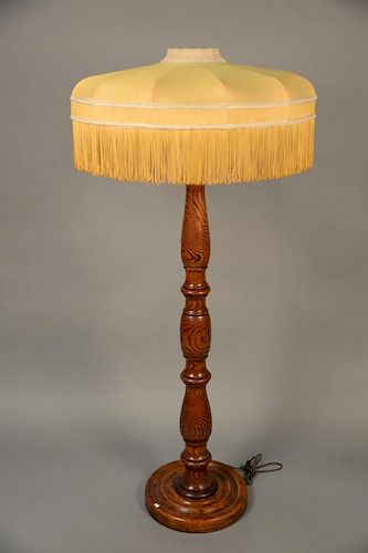 Oak floor lamp with custom silk shade. ht. 61in. Provenance: Property from the Estate of Frank Perrotti Jr. of Hamden, Connec