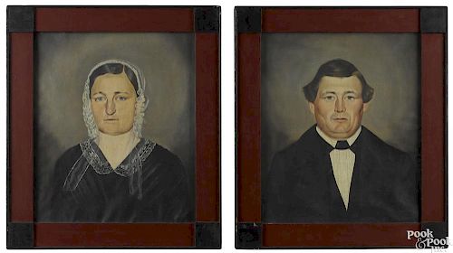 Pair of American oil on canvas folk portraits
