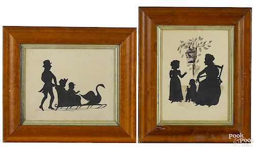 Two watercolor silhouette family groups, 19th c.