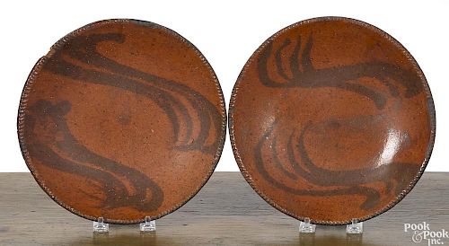 Pair of redware plates, 19th c.