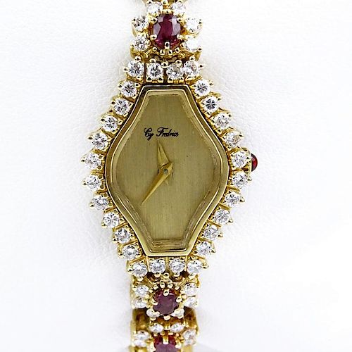 5.50 Carat Round Brilliant Cut Diamond, 4.50 Carat Oval Cut Ruby and 14 Karat Yellow Gold Bracelet Watch with Quartz Movement