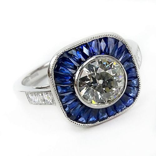 .95 Carat Old European Cut Diamond, .87 Carat Calibre Cut Sapphire and Platinum Ring.