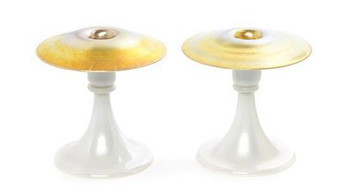 A Pair of Steuben Gold Aurene and Calcite Candlesticks, Height 6 inches.