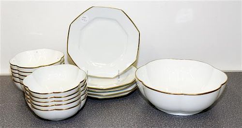 * A Group of Limoges Porcelain Serving Articles Diameter of fluted serving bowl 9 1/2 inches.