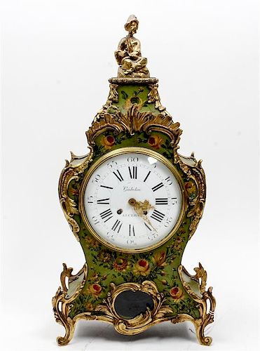 * A Louis XV Style Gilt Metal Mounted Painted Mantel Clock Height 21 inches.