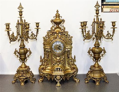 A Continental Gilt Metal Clock Garniture, Imperial Height of clock 24 inches.