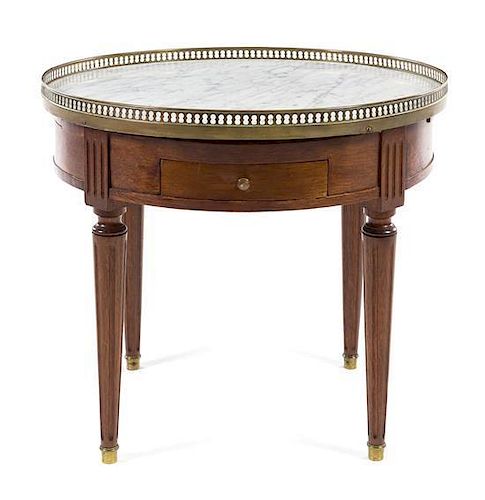 A Louis XVI Style Gueridon Height 21 x diameter 23 3/4 inches.