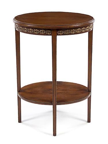 A Gilt Metal Mounted Mahogany Occasional Table Height 29 x width 21 x depth 16 3/4 inches.