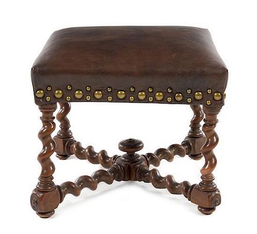 A William and Mary Style Walnut Ottoman Height 16 x width 19 x depth 19 inches.