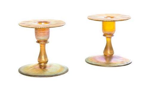 A Pair of Tiffany Studios Gold Favrile Glass Candlesticks, Height 3 7/8 inches.