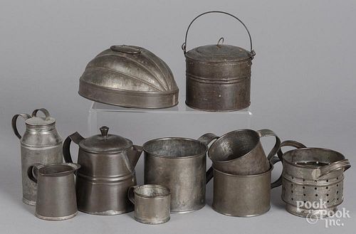 Collection of tin kitchenware.