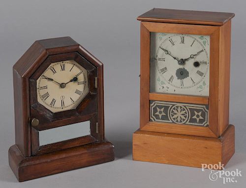 Two pine mantel clocks