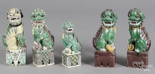 Five Chinese porcelain foo lions, 20th c.