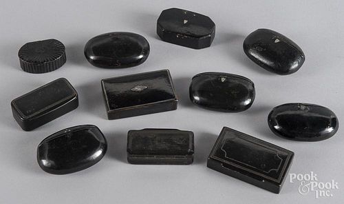 Eleven black lacquer snuff boxes, 19th c.