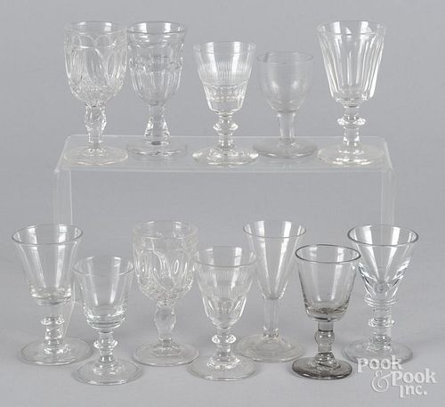 Twelve colorless glass cordials, 19th/20th c.