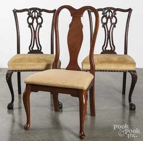 Three reproduction side chairs.