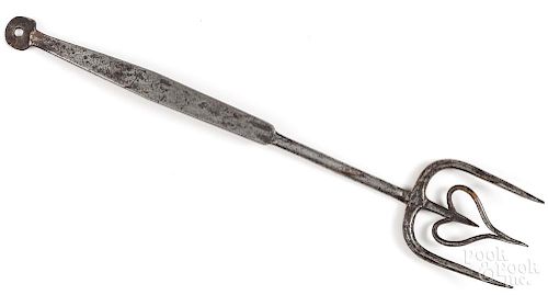 Wrought iron flesh fork with heart cutout, 19th c.