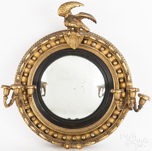 Giltwood convex mirror, late 19th c.