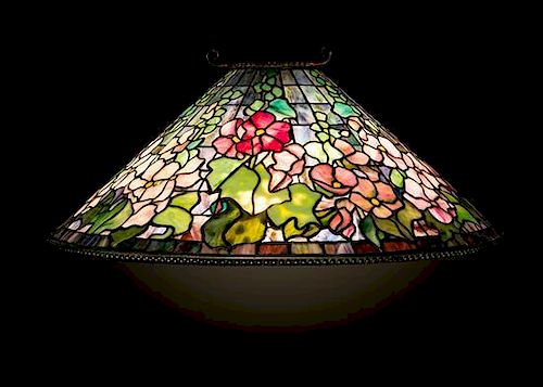 A Tiffany Studios Favrile Glass Hollyhock Hanging Shade, Diameter 28 1/2 inches.