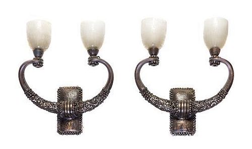 A Pair of Edgar Brandt Patinated Wrought Iron and Daum Acid Etched Glass Sconces, Height 14 1/4 x width 12 1/2 inches.