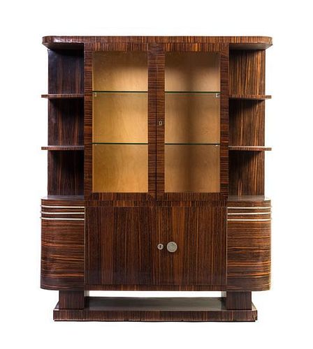 A French Art Deco Macassar Ebony Vitrine Cabinet, Height 55 1/8 x width 45 1/4 x depth 16 inches.