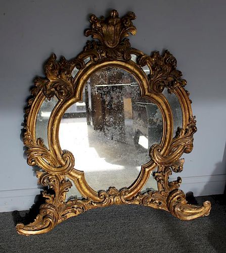19th Century Rococo Carved Giltwood Mirror.