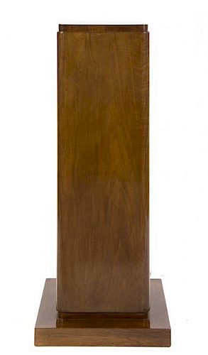 An Art Deco Walnut Pedestal, Height 49 1/4 inches.