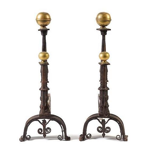 A Pair of Italian Baroque Brass and Iron Andirons Height 30 inches.