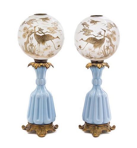 A Pair of Italian Gilt Metal Mounted Glass Fluid Lamps Height of lamp base 17 inches.