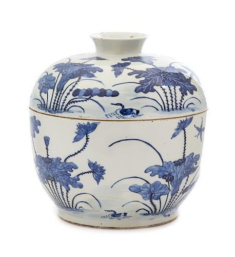 A Chinese Blue and White Porcelain Bowl and Cover Height 10 1/2 x diameter 10 inches.