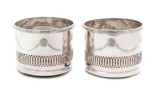 A Pair of Italian Silver-Plate Wine Coasters Height 4 3/4 inches.