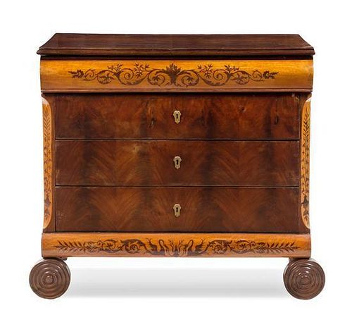 An Italian Walnut, Satinwood and Marquetry Commode Height 41 1/2 x width 45 x depth 22 1/2 inches.