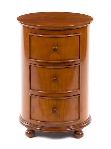 An Italian Walnut Pedestal Cabinet Height 25 1/4 x diameter of top 16 3/4 inches.