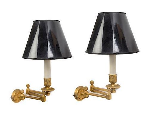 A Pair of Empire Style Gilt Metal Swing-Arm Sconces Height overall 15 inches.