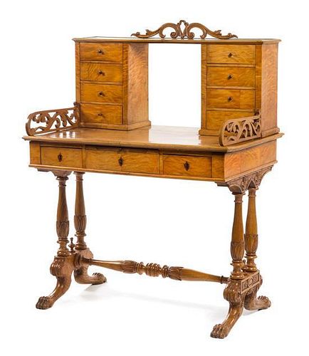 An Austrian Empire Birch Lady's Writing Table Height 49 1/2 x width 37 1/4 x depth 24 3/8 inches.