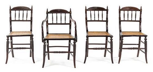 A Set of Four Victorian Turned Oak Game Chairs Height 32 1/2 inches.
